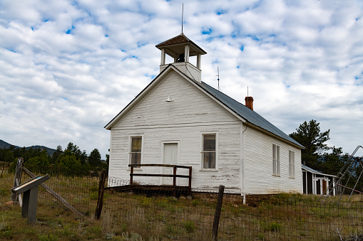 Rocky Mountain community ancient unused schoolhouse in Terryall in Colorado in western USA of North America. Nearest cities/towns are Colorado Springs, Denver, Fairplay,and Lake George, Colorado.