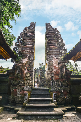Gate on territory of Holy Spring Water Temple (Pura Tirta Empul) on Bali, Indonesia.