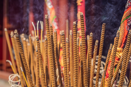 Incense burning Embossed in an incense pot. There is a lot of smoke.