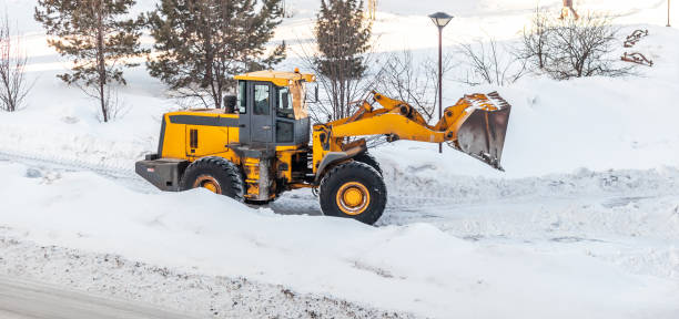 istock Snow clearing. Tractor clears the way after heavy snowfall. 1681659849