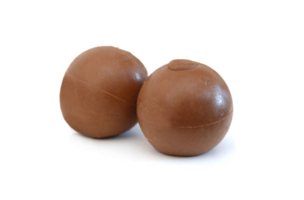 istock Chocolate candies isolated on white background 1681660889