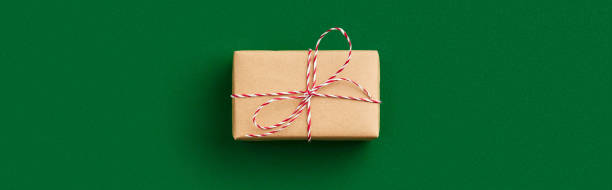 istock Christmas celebration concept. Gift on green background 1681661928