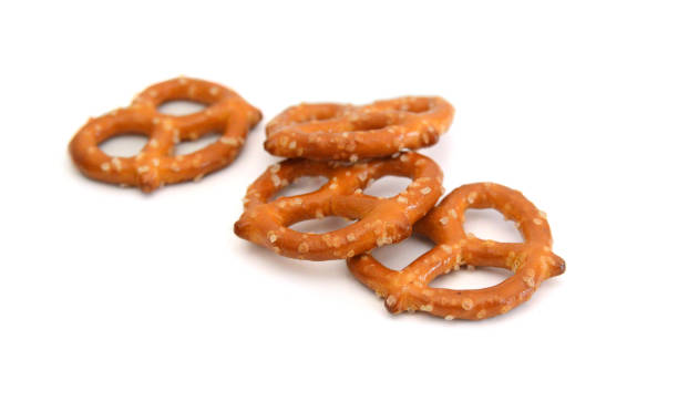 istock Crispy pretzels on white background 1681674615