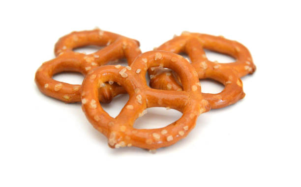 istock Crispy pretzels on white background 1681674616