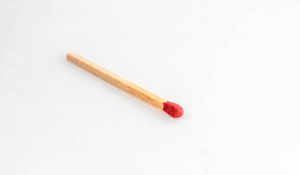 istock Close up of match isolated on white. Single red match stick. 1681713568
