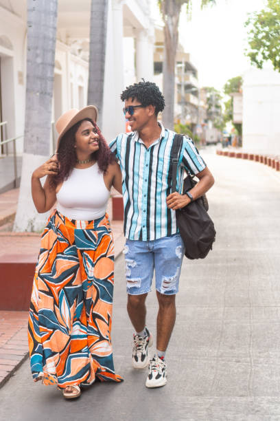 istock Latin couple exploring urban avenues 1681718037