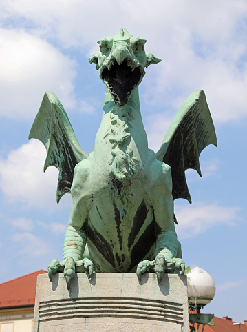 Ljubljana, L, Slovenia - August 16, 2023: Statue of a DRAGON symbol of the European Capital