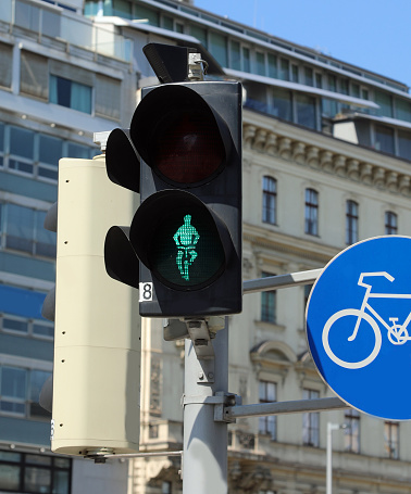 Vienna, WIEN, Austria - August 22, 2023: traffic light with symbol of person on bike