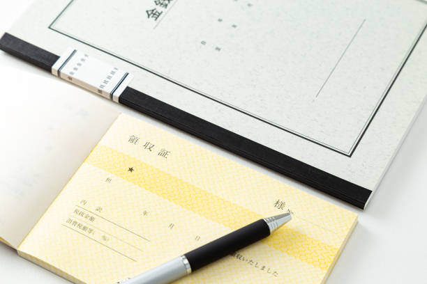 istock Account book and receipt on a white background. 1681765848
