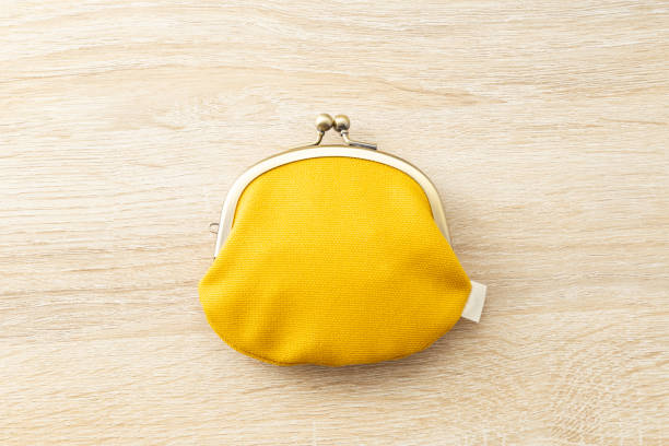 istock A yellow wallet on the desk. 1681766503