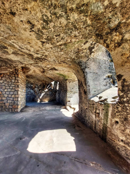 istock Sunlight falling into underground vault made of rocks 1681834585