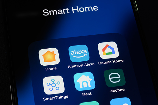 Toronto, Canada - September 14, 2023:  Popular smart home apps, including Apple Home, Amazon Alexa, Google Home, Samsung SmartThings, Nest and Ecobee on an Apple iPhone.
