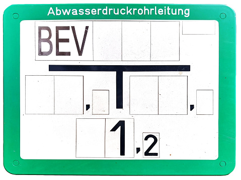 German utility location marker BEV (Be und Entluftungsventil - ventilation valve) of Abwasserdruckrohrleitung (vacuum sewer pipe).