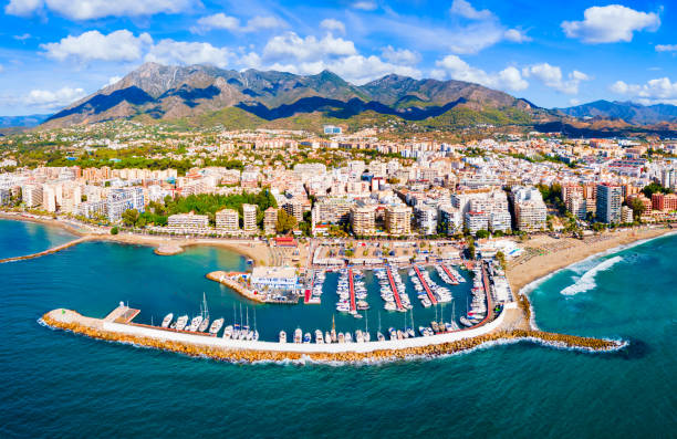 Marbella city port and beach aerial panoramic view