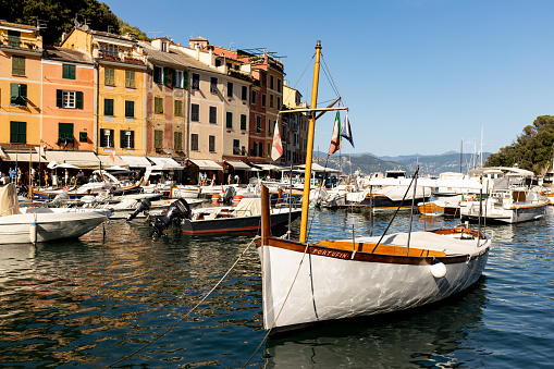 Portofino is an Italian fishing village and holiday resort famous for its picturesque harbor and historical association with celebrity and artistic visitors.