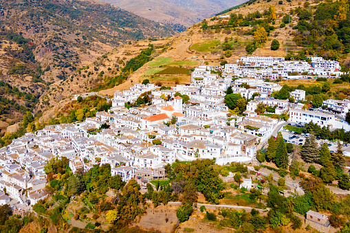 Capileira village aerial panoramic view. Capileira is a village in the Alpujarras area in the province of Granada in Andalusia, Spain.