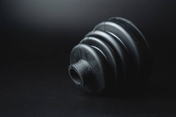 New car parts. Car wheel joint boot, CV joint rubber boot, on a black background