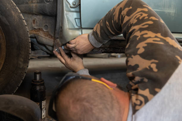 istock The mechanic repairs a car threshold. 1682033968