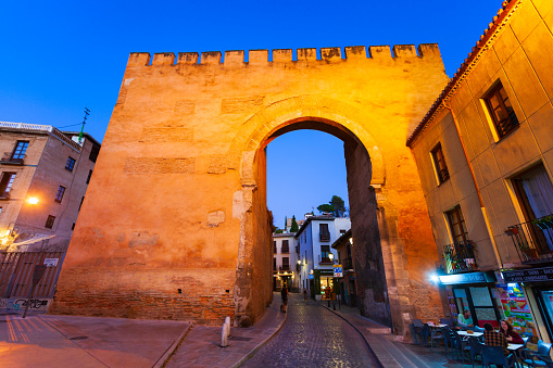 Granada, Spain - October 21, 2021: The Gate of Elvira or Puerta de Elvira is an arch located in Granada, Spain