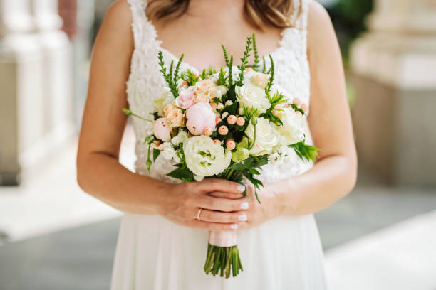 istock Bride holding a beautiful bouquet 1682040704