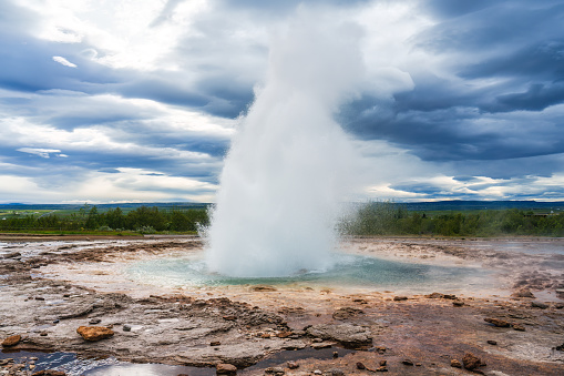 Geological phenomenon of Strokkur Geyser eruption, natural hot spring pulsing in national park at Iceland