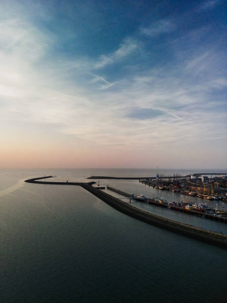 istock port city at sunset, many ships view from a drone 1682068488