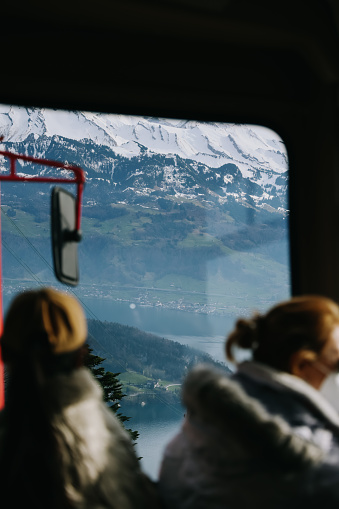 Schwyz, Switzerland - April 12, 2022: Cogwheel train window view of railway track Rigi Kulm line, Switzerland.
