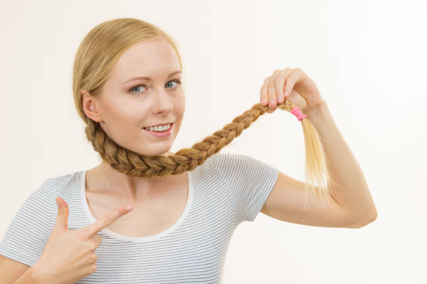 istock Blonde girl with braid hair 1682085434