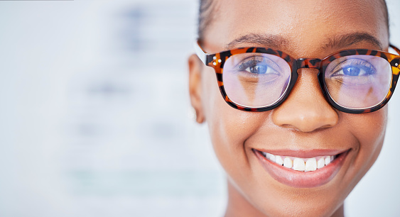 Face, black woman and glasses in ophthalmology, smile and vision in healthcare for wellness in hospital. Portrait, frame and African person in eyewear, lens or prescription spectacles on mockup space