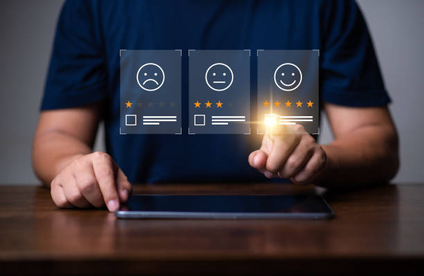 istock Customer rating and satisfaction concept, Man using tablet and tick a checkbox for give five star symbol to increase rating of product and service concept. 1682121481