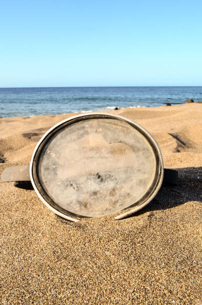 istock Diving Mask on the Sand Beach 1682159733