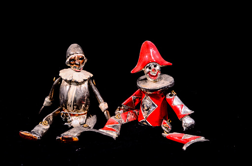 Metal Handmade Statue of a Carnival Puppet on Black Background