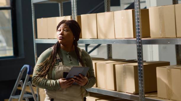 istock Warehouse sorter checks inventory 1682169427