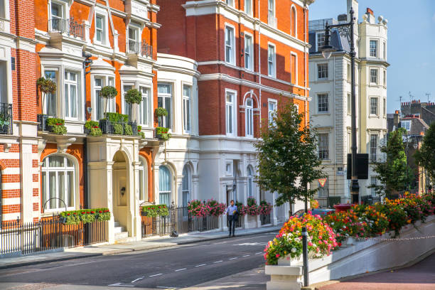 Street view in Mayfair with beautiful periodic buildings. London London, UK - 9 September, 2023: Street view in Mayfair with beautiful periodic buildings. Mayfair is one of the richest areas to live with fancy lifestyle Mayfair stock pictures, royalty-free photos & images