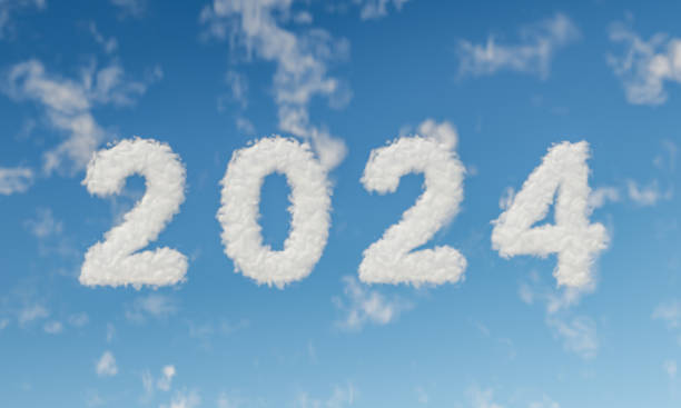 signe du nouvel an 2024 écrit avec des nuages dans le ciel - cumulus cloud condensation sky blue photos et images de collection