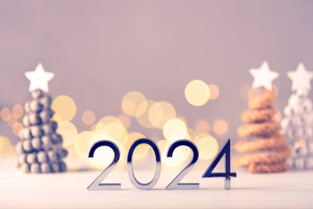 istock Metal numbers 2024 on table with bokeh lights. 1682173845