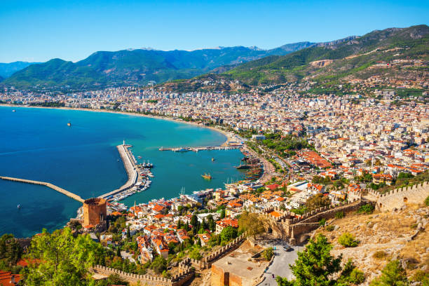 Alanya aerial panoramic view, Turkey Kizil Kule Red Tower, Alanya castle and port aerial panoramic view in Alanya city, Antalya Province on the southern coast of Turkey alanya stock pictures, royalty-free photos & images