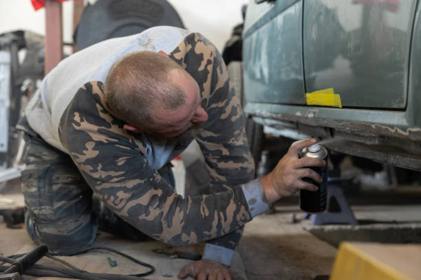 istock The mechanic repairs a car threshold. 1682210730