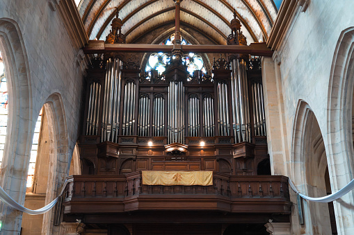 Rouen, France. Long metal canes and an elegant wooden structure in the Gothic-style main nave.