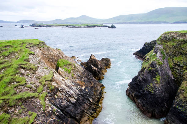 landscape of Blasket Island, and island near Dingle in Dingle peninsula. Cliffs, atlantic ocean and beautiful green vegetation
