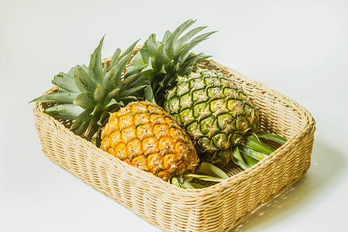 Pineapples in basket in restaurant