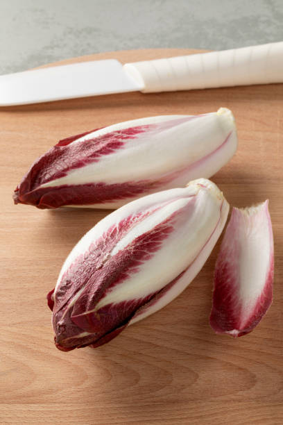 istock Pair of fresh raw radicchio rosso close up 1682231455