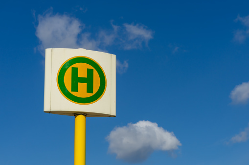 Germany, Berlin, September 01, 2023 - Low angle view of busstop sign against sky Berlin Marzahn