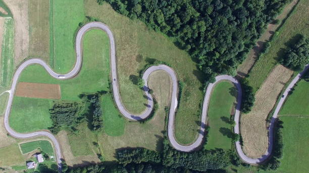 istock Aerial Of Winding Switchback Road Overhead 1682253223