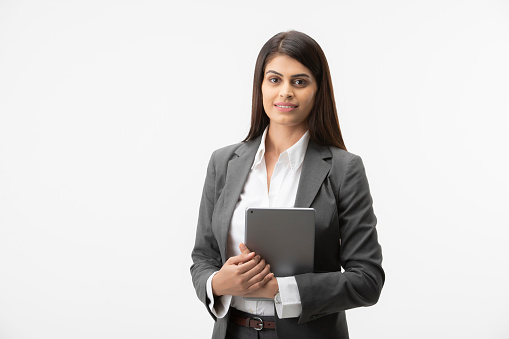 Happy Businesswoman over white background.