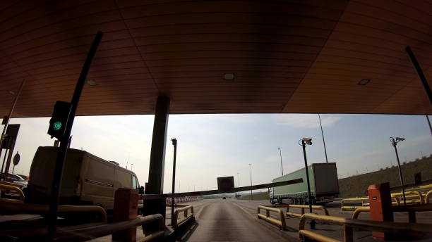 istock Dash Cam Barrier Red Green Light Driving POV 1682255465