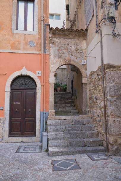 istock typical small natural stone staircase and wall with semicircular arch in the old town of taormina 1682256236