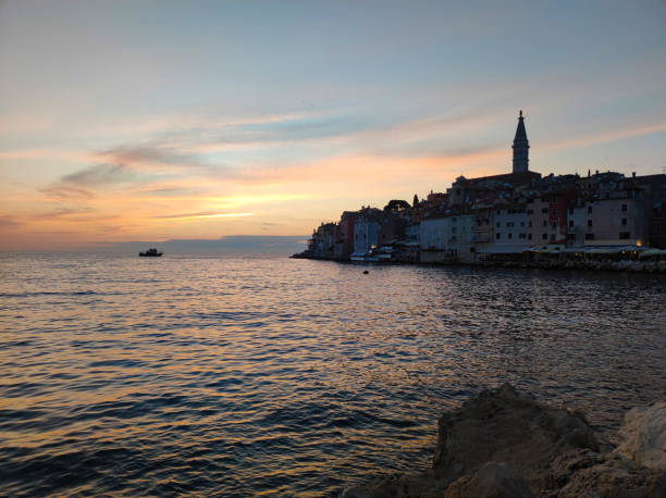istock colorful sunset in Rovinj old town 1682270595
