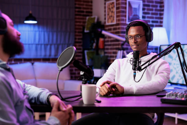 istock Influencer recording podcast with guest 1682281532