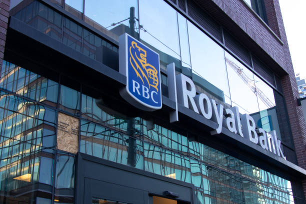 RBC, Royal Bank of Canada logo atop a bank branch. stock photo